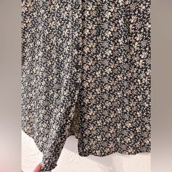 SOLD. Black Skirt, nude flower print. Flattering, nice fall to it. - Picture 2 of 7